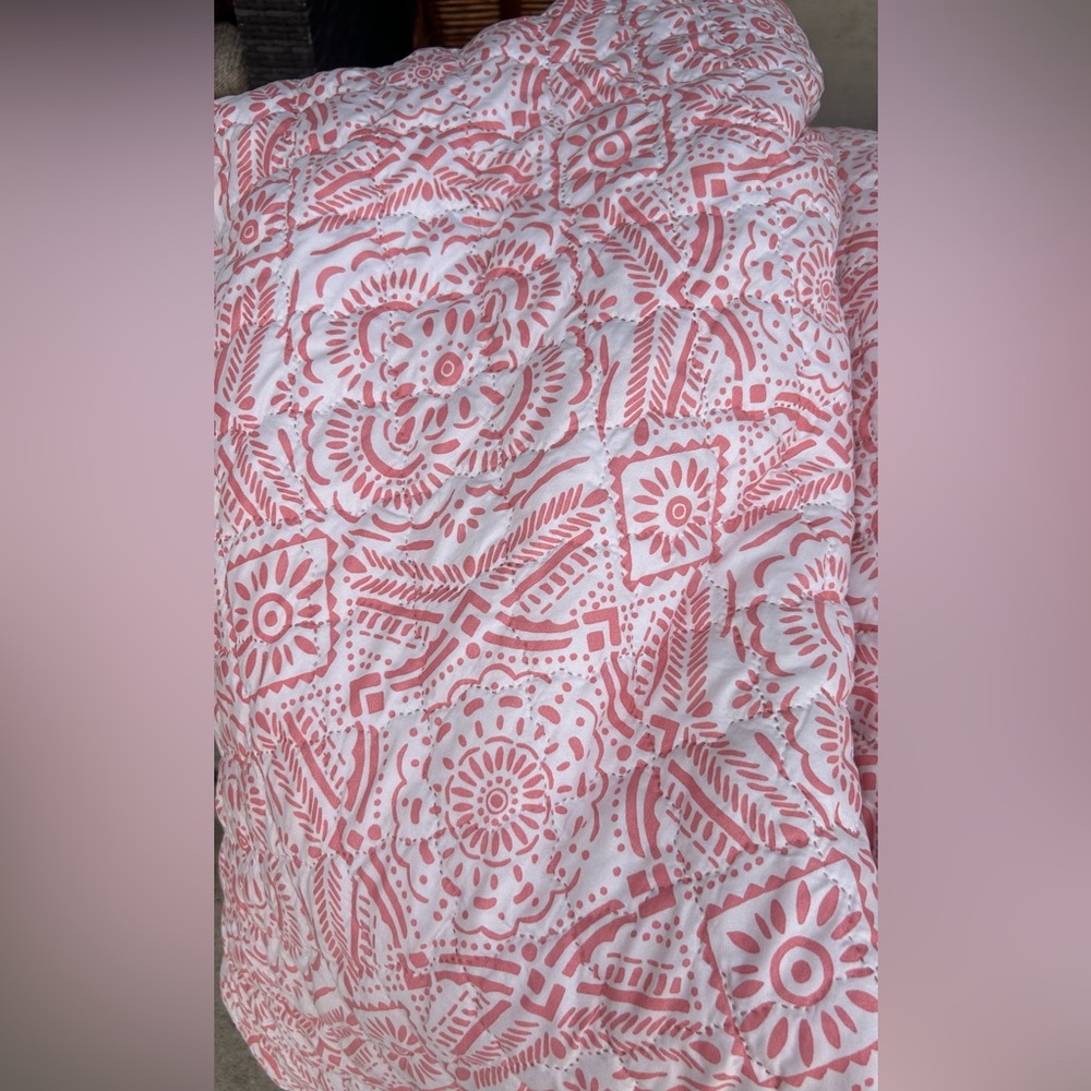 Pink and White Patterned quilt